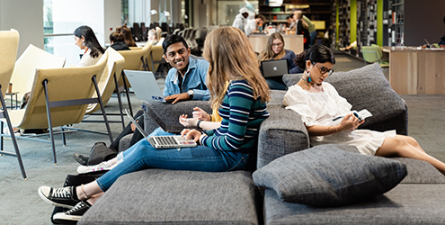 Students relaxing, studying in the Melbourne library