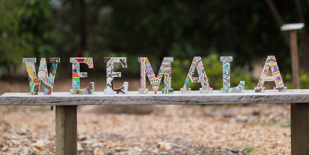 Weemala spelt out in steel artistic letters in a garden