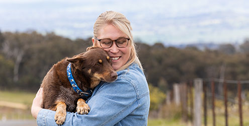 Sarah snuggles puppy