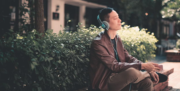 Man listening to music outdoors