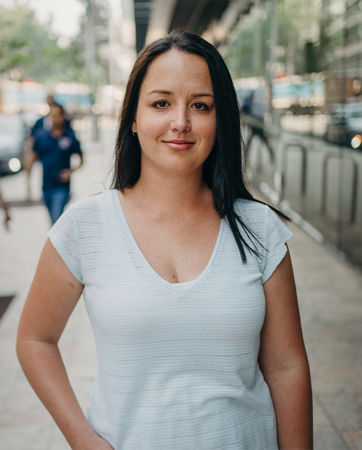 Kristina Zillhardt on a city street smiling at the camera