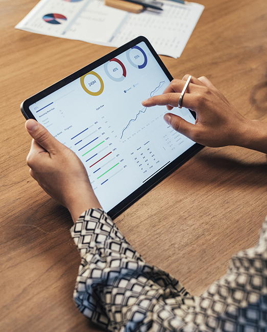 Woman's hand using iPad.