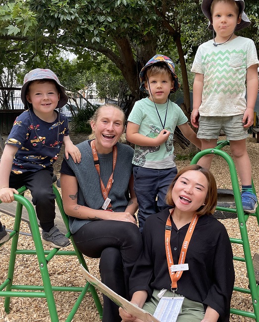 Early childhood teachers with children.
