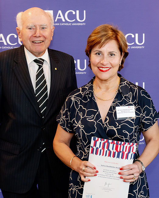 Sylvia MacRitchie-Hook and former PM John Howard