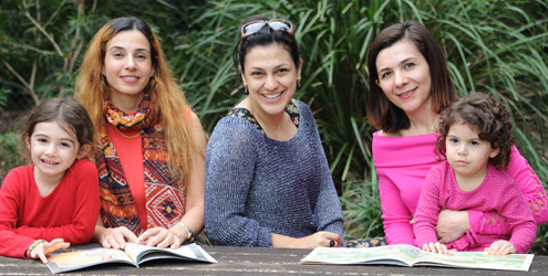 Dr Shahaeian with mothers and children