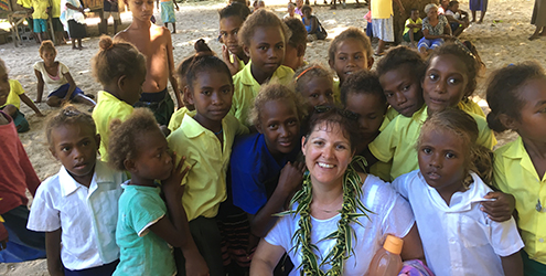 Dr Jones with local school children