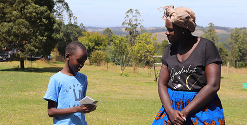Thiong reads his book at a workshop in Gippsland, Victoria