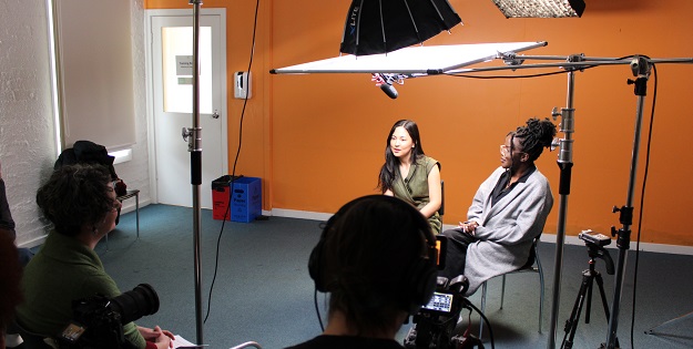 Jen Rose interviewing young migrants.