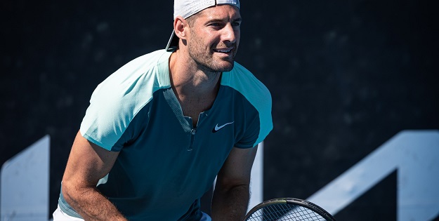 Alan Obst having a hit of tennis